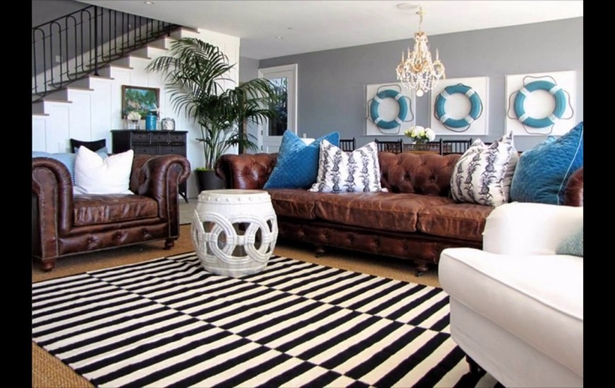 white coffee table with brown leather couch